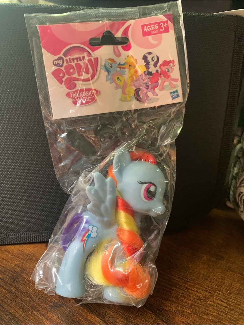 My Little Pony Blue Pegasus with Rainbow Mane and Pink Eyes